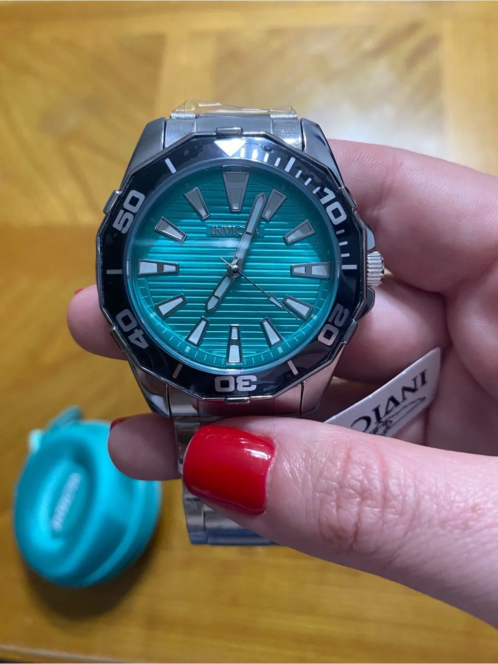 Invicta Men's Silver Watch with Turquoise Dial and Black Bezel